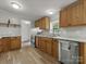 Kitchen with wood cabinets, stainless steel appliances, and a view of the outdoors at 141 Hickory Creek Dr, Gastonia, NC 28052