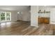 Bright living room with hardwood floors and a view of the outdoors at 141 Hickory Creek Dr, Gastonia, NC 28052
