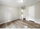 Spacious living room with wood-look floors at 141 Hickory Creek Dr, Gastonia, NC 28052