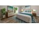 Staged main bedroom with cozy decor and a view of the outdoors at 141 Hickory Creek Dr, Gastonia, NC 28052