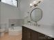 Charming bathroom features a soaking tub, stylish vanity, and modern fixtures at 1437 Jules Ct, Charlotte, NC 28226