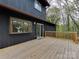 Spacious wooden deck overlooking a lush backyard, perfect for outdoor entertaining and relaxation at 1437 Jules Ct, Charlotte, NC 28226