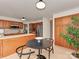Kitchen with oak cabinets, stainless steel appliances, and breakfast nook at 1437 Jules Ct, Charlotte, NC 28226