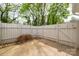 Cozy fenced backyard featuring a small tree and a concrete patio space at 1532 Hunt Club Ct, Rock Hill, SC 29732