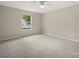 Neutral bedroom with carpet, a ceiling fan and a window for natural light at 1532 Hunt Club Ct, Rock Hill, SC 29732