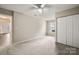 Large bedroom with ceiling fan, closet, neutral paint and carpet at 1532 Hunt Club Ct, Rock Hill, SC 29732