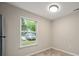 Bright dining area featuring a large window offering natural light and a view of the outdoors at 1532 Hunt Club Ct, Rock Hill, SC 29732