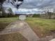 Large backyard featuring a storage shed and plenty of open space at 1628 B Se Ave, Hickory, NC 28602