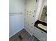 Bathroom featuring extra storage cabinets and a vanity with a sink at 1628 B Se Ave, Hickory, NC 28602