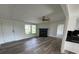 Comfortable living room with a fireplace and new floors at 1628 B Se Ave, Hickory, NC 28602
