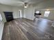 Bright living room flows seamlessly into the open kitchen, with fireplace at 1628 B Se Ave, Hickory, NC 28602