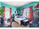 Cozy bedroom features unique decor, carpet, and a ceiling fan at 16431 Leavitt Ln, Davidson, NC 28036