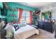Cozy bedroom with a large window, decorative shelves, and a comfortable bed at 16431 Leavitt Ln, Davidson, NC 28036