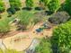 A top-down perspective of a well-maintained playground with modern equipment, perfect for Gathering fun and outdoor activities at 16431 Leavitt Ln, Davidson, NC 28036