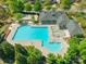 An aerial view reveals a beautiful community pool and surrounding amenities for outdoor relaxation and recreation at 16431 Leavitt Ln, Davidson, NC 28036