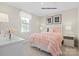 Comfortable bedroom with a cozy bed, soft lighting, and a window offering a pleasant outdoor view at 169 Basildon St # 1012, Lancaster, SC 29720