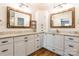 This bathroom has double sinks, granite countertops, and wood laminate flooring at 1720 Gaither Rd, Belmont, NC 28012