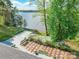 Elevated deck offers stunning views of the lake, complemented by lush greenery and a cozy outdoor space at 1720 Gaither Rd, Belmont, NC 28012