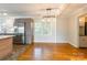 Dining Area with natural light, hardwood flooring, and modern lighting at 1720 Gaither Rd, Belmont, NC 28012