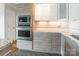 Kitchen featuring built-in microwave, oven, granite countertops, and tile flooring at 1720 Gaither Rd, Belmont, NC 28012