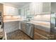 Kitchen with white cabinets, granite countertops, stainless steel appliances, and sink at 1720 Gaither Rd, Belmont, NC 28012