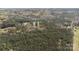 Expansive aerial view of a wooded lot, marked with a yellow border, off Mask Road, offering privacy at 174 Maske Rd, Mount Gilead, NC 27306