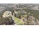 A beautiful aerial view of Mask Road property, surrounded by tall trees at 174 Maske Rd, Mount Gilead, NC 27306