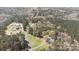 A beautiful aerial view of Mask Road property, surrounded by tall trees at 174 Maske Rd, Mount Gilead, NC 27306