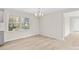 Bright dining room with wood flooring and a modern chandelier at 174 Maske Rd, Mount Gilead, NC 27306