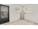 Bright room featuring an on-demand water heater and ample natural light at 174 Maske Rd, Mount Gilead, NC 27306