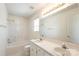Bright bathroom with double sink vanity, tub-shower combination, and window for natural light at 1805 Lawton Dr, Rock Hill, SC 29730