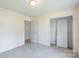 Comfortable bedroom features neutral walls, carpet flooring, and a ceiling light fixture at 1805 Lawton Dr, Rock Hill, SC 29730