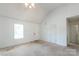 Spacious bedroom with neutral walls, carpet flooring, and natural light from the window at 1805 Lawton Dr, Rock Hill, SC 29730