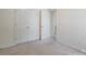 Bedroom with neutral carpet, double closet, and a connecting open doorway at 1805 Lawton Dr, Rock Hill, SC 29730
