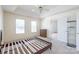 Bright main bedroom featuring carpet, natural light, with closet and en-suite bathroom entrances at 1805 Lawton Dr, Rock Hill, SC 29730