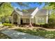 Charming home with well-manicured landscaping and covered entryway, offering a welcoming curb appeal at 18838 Oakhurst Blvd, Cornelius, NC 28031