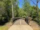 Stroll along this picturesque walking bridge, perfect for enjoying the beauty of nature at 18838 Oakhurst Blvd, Cornelius, NC 28031