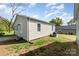 Charming home featuring a well-maintained backyard with green grass, perfect for relaxation and outdoor activities at 1926 Coley Sw St, Concord, NC 28027