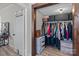 Walk-in closet with ample storage space, and wooden accents at 207 Kerr Nw St, Concord, NC 28025