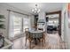 Inviting dining room with plenty of natural light and open access to the living room at 207 Kerr Nw St, Concord, NC 28025
