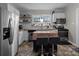Well-equipped kitchen with stainless steel appliances and a functional island at 207 Kerr Nw St, Concord, NC 28025