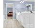 Bright bathroom features a double vanity with white cabinets at 2125 Arbor Vista Dr, Charlotte, NC 28262