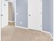 Neutral bedroom with a door leading to another room, and another interior door at 2125 Arbor Vista Dr, Charlotte, NC 28262