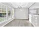 Elegant dining room with ample natural light and modern chandelier at 2125 Arbor Vista Dr, Charlotte, NC 28262