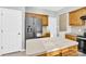 A modern kitchen offering an island, light countertops, and stainless steel appliances at 2125 Arbor Vista Dr, Charlotte, NC 28262