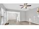 Bright and spacious living area with hardwood floors and modern ceiling fan at 2125 Arbor Vista Dr, Charlotte, NC 28262