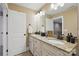 Bright bathroom with double vanity, granite countertops and modern fixtures at 307 Jaida Ln, Oakboro, NC 28129
