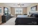 Bedroom featuring natural light, a comfortable bed, dresser, and neutral decor at 307 Jaida Ln, Oakboro, NC 28129
