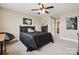 Bedroom featuring ceiling fan, comfortable bed, and natural light at 307 Jaida Ln, Oakboro, NC 28129