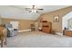 Bonus room with neutral walls, carpet and comfortable seating at 307 Jaida Ln, Oakboro, NC 28129